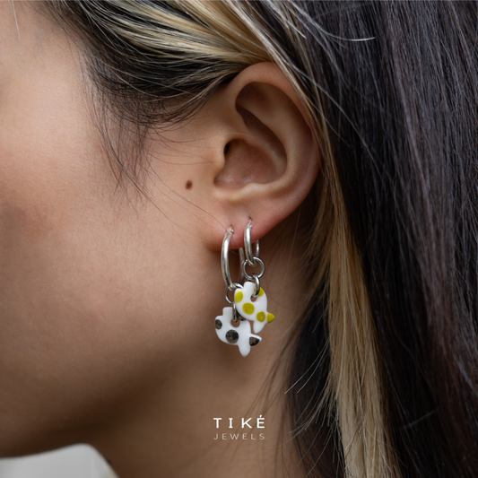 Charms di Identità: Tessendo Storie Personali con la Collezione di Tiké Jewels