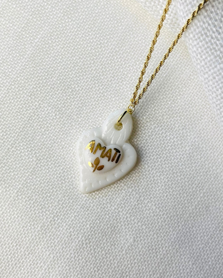 Collana Torchon Cuore Sacro in Porcellana