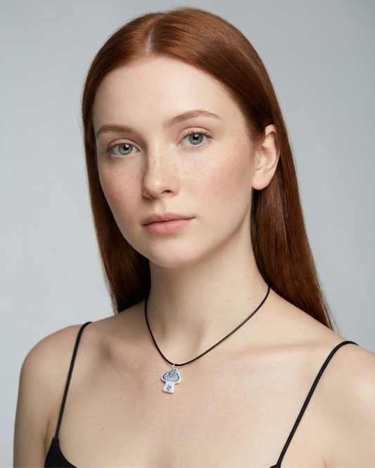 Charmes - pendentif en porcelaine de soleil bleu