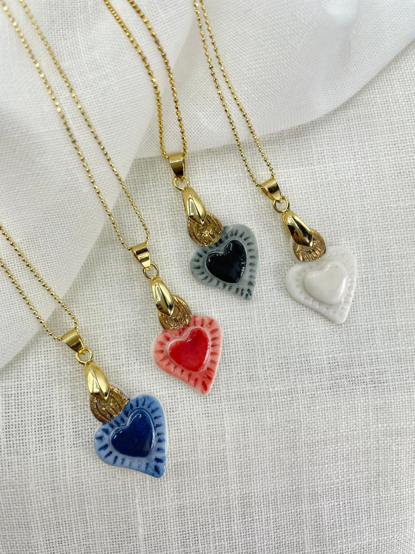 Collana Pallini Cuore Sacro in Porcellana